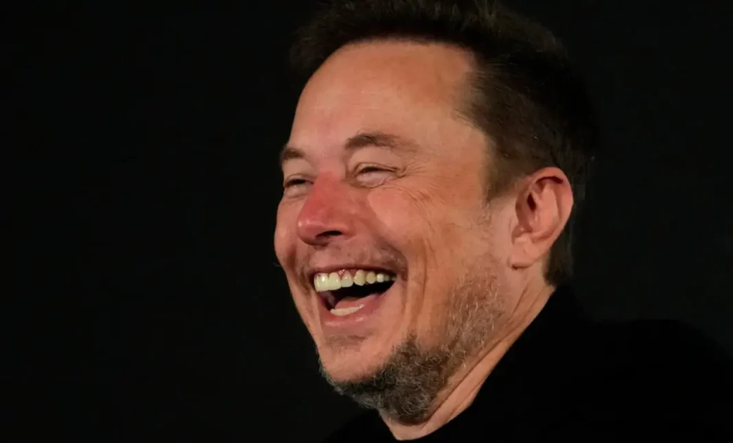 elon-musk-laughing Elon Musk